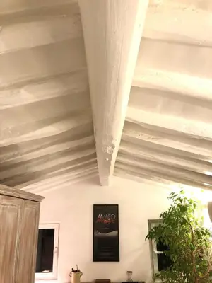 a ceiling in a room with wooden beams at Navona Luxury Suite Apartment by NDP rent in Rome