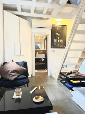 a living room with a couch and a table at Navona Luxury Suite Apartment by NDP rent in Rome