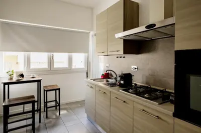 a kitchen with a stove and a counter top at Vatican View in Rome