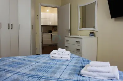 a bedroom with a bed with towels on it at Your Perfect Roman Getaway in Vatican in Rome