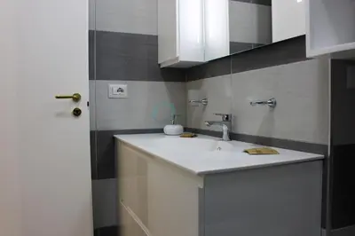 a bathroom with a sink and a mirror at Your Perfect Roman Getaway in Vatican in Rome