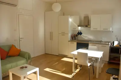 a small living room with a couch and a table at Quadrilatero Flat in Rome
