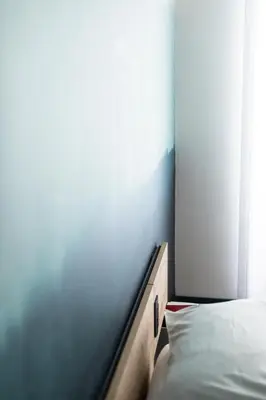 a bedroom with a bed and a window at Circolo degli Scipioni in Rome