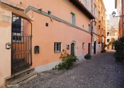an alley in an old town with buildings at MauveSweetRhome 1 in Rome