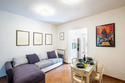 a hallway with a staircase in a house at Milvio Urban House in Rome