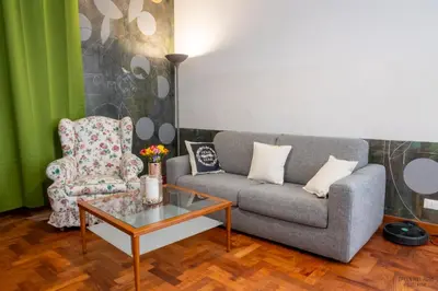 a living room with a couch and a coffee table at Green Hill Rome Suite Home in Rome