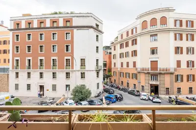 a view of a city street with buildings at Villa Borghese cozy apt in Rome