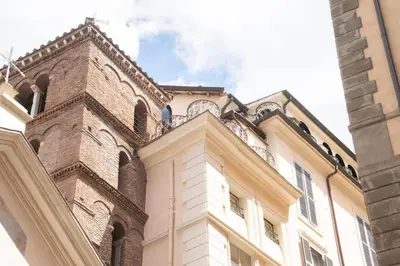 a building with a clock tower on top of it at Alessio Luxury House Roma Pantheon-Piazza Navona in Rome
