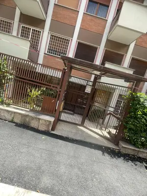 a fence in front of a building at Carpegna Vatican House in Rome