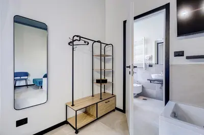 a bathroom with a shower and a sink at VIVILO COLLECTION - Muggia 21 Suites in Rome