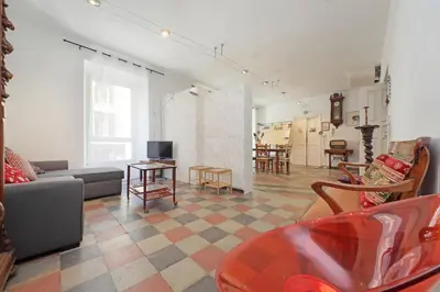 a living room with a couch and a table at Cavour in Rome