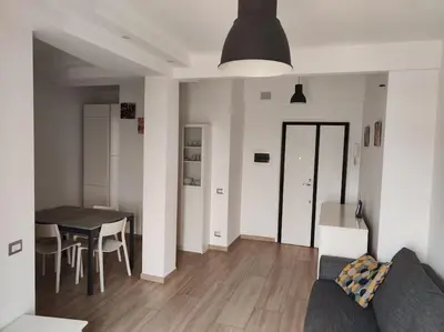 a living room with a couch and a table at Ion Apartment in Rome