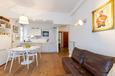 a living room with a couch and a table at Elegant Escape near the Vatican in Rome