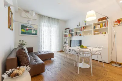 a living room with a couch and a table at Elegant Escape near the Vatican in Rome