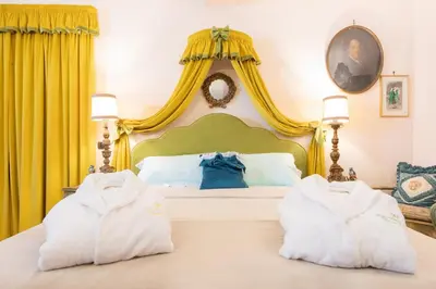 a bedroom with a bed with two towels on it at Loft Appia Antica Donna Eugenia in Rome