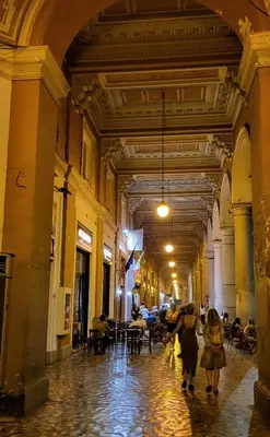 a group of people walking through a hallway in a building at Rome Jubilee Stays in Rome