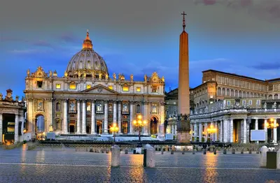 a large building with a tower in front of it at Magenta Collection Terrione 19 in Rome