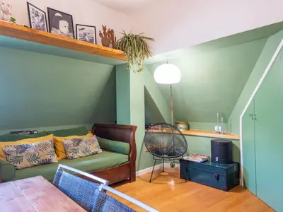 a living room with a couch and a table at Apartment Tiziano by Interhome in Rome
