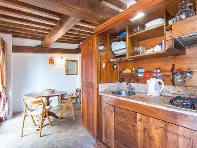a kitchen with a sink and a counter at Apartment Charming Terrace by Interhome in Rome