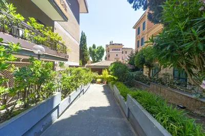a walkway between two buildings in a city at Villino San Cosimato, nel cuore di Trastevere in Rome