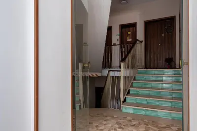 a view of a stairway with a glass entry way at DiTullio18 - Cipro Balduina in Rome