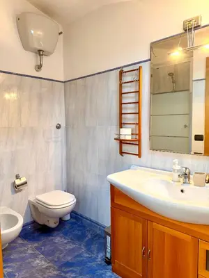 a bathroom with a sink and a toilet at Attic Garden in Rome