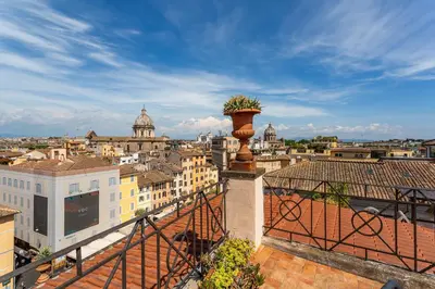 a view of a city from the roof of a building at iFlat Campo de' Fiori Panoramic Penthouse in Rome