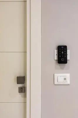 a door with a remote control attached to it at Clodio Welcome - 5 camere arredate con bagno interno - zona comune - condizionatori - in Rome