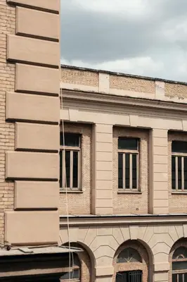 a building with windows on the side of it at NAMAN HOTELLERIE - Monti in Rome