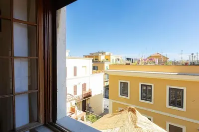 a view of a city from a window at Appartamento Vatican Terrace in Rome