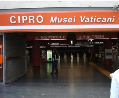 a woman standing in the entrance to a shopping mall at B&B Behind the Vatican in Rome