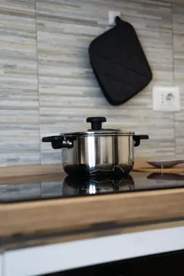 a pot sitting on top of a stove at Domus Clelia in Rome