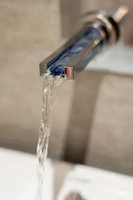 a stream of water coming out of a faucet at Saint John Loft in Rome