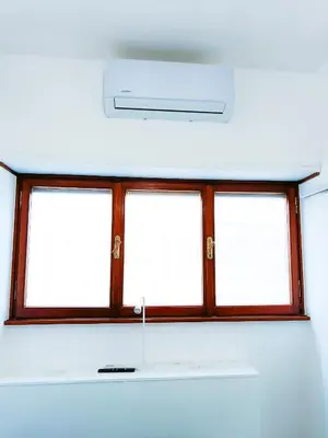 a window in a white room with four windows at Betania Loft in Rome