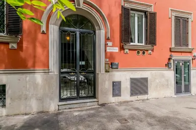 an entrance to a building with a glass door at Apartment Maison 170 - Rome in Rome