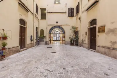an empty alley in an old building at Hostly-Urban Oasis Turati-Few Steps from Colosseum in Rome