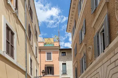 a view of an alley between two buildings at Luxury Suite Coronari in Rome