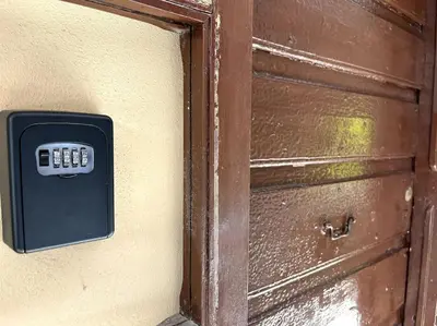 a remote control on the side of a door at Oasi Floreale - Roma Termini in Rome