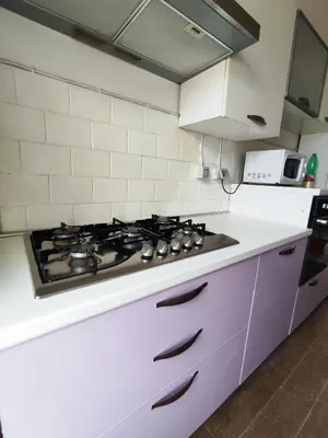 a kitchen with a stove top oven in a kitchen at Casa Cornelia Station in Rome