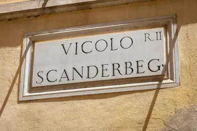a street sign on the side of a building at Luxury Suite Trevi in Rome