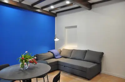 a living room with a couch and a table at Casa del Giglio in Rome