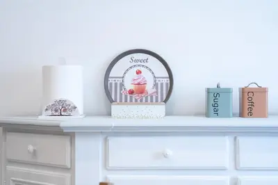 a shelf with a dresser with a sweet sign on it at Charming Apartment Gregory in Rome