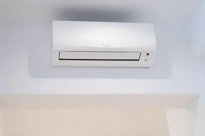a microwave oven sitting on top of a white wall at Charming Apartment Gregory in Rome
