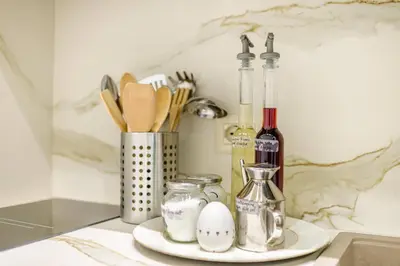 a counter with two eggs and bottles of wine at Riboty 10 Suites in Rome
