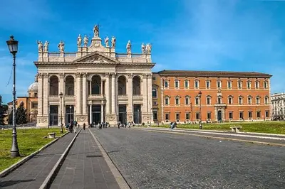 a large building with a street in front of it at Liberty Home in Rome