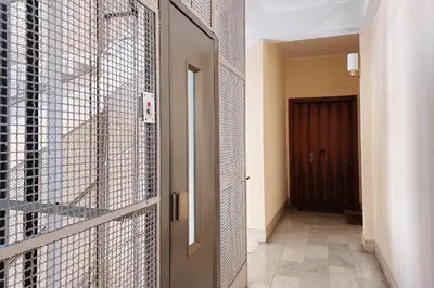 a door in a room with a hallway at Comfy home for family next to Metro in Rome