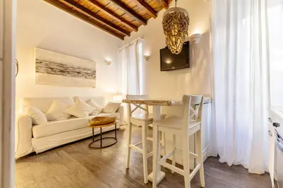 a living room with a couch and a table at Piazza Navona Elite Flat in Rome