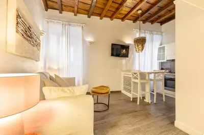 a living room with a couch and a table at Piazza Navona Elite Flat in Rome