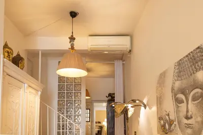 a bunch of umbrellas in a city with buildings at Campo dei Fiori Elite Luxury for 10 guests in Rome