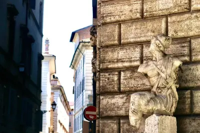 a statue of a woman on the side of a building at Casa Acerbo - Rome Navona Apartment in Rome
